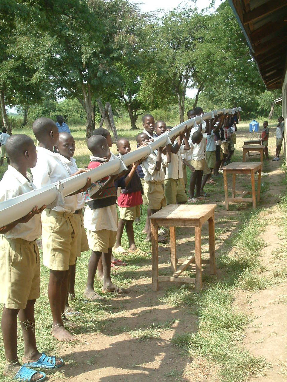 Students installing gutters